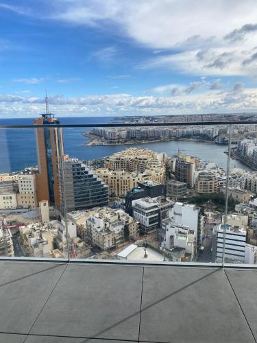 a view of a city from the top of a building at Mercury tower Elena K 24th Floor panoramic view Apt in St. Julianʼs