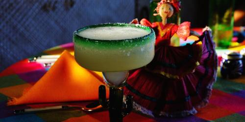 a green drink in a martini glass on a table at La Valise Los Cabos in Boca de la Vinorama