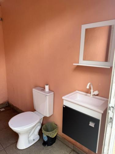 a bathroom with a toilet and a sink at Edilson santos in João Pessoa