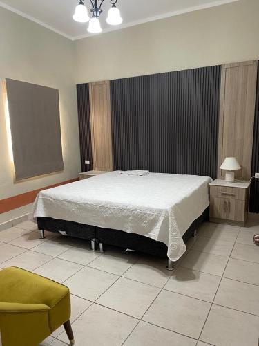 Postel nebo postele na pokoji v ubytování Casa Monaco