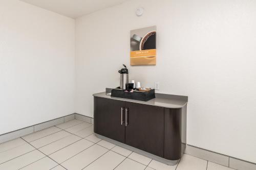 a kitchen with a counter in a room at Motel 6 Fort Worth, TX - North in Fort Worth