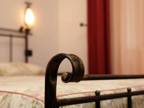 a close up of a wooden frame of a bed at Albergo Le Macinaie - Monte Amiata in Castel del Piano