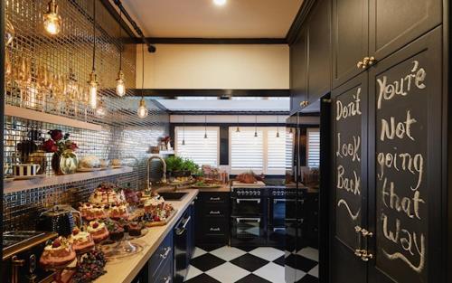 a kitchen with a counter with food on it at La Belle Maison in Tauranga