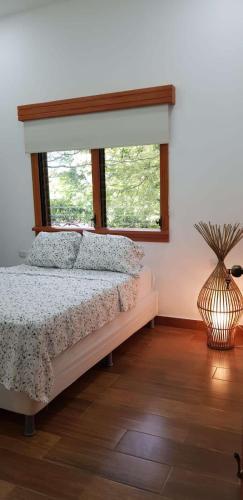 Llit o llits en una habitació de Casa alejo