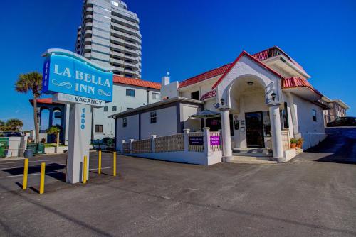 a sign for a la ballilla inn in front of a building at La Bella Inn - POOL OPEN in Daytona Beach