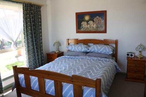 Ένα ή περισσότερα κρεβάτια σε δωμάτιο στο Maslin Beach House