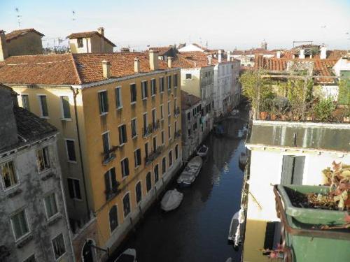 a view of a canal in a city with buildings at Hotel Ca' D'Oro - WENICE Deep Culture in Venice