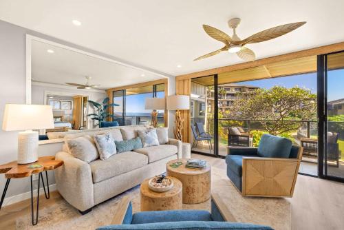a living room with a couch and a ceiling fan at MA-1205 - Ocean Views AC in Koloa