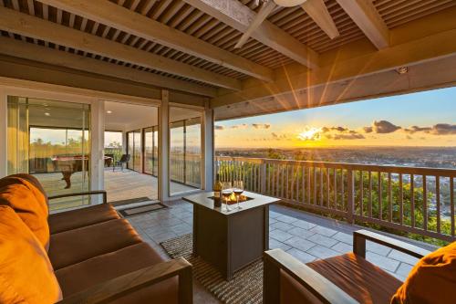 a living room with a couch and a view of the ocean at Stunning View Estate with Pool & Game Room in La Mesa