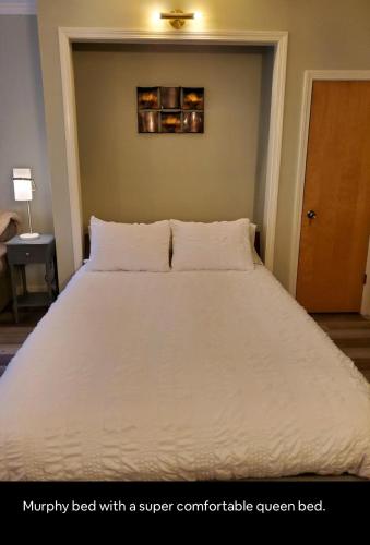 a bedroom with a bed with a super comfortable queen bed at Cozy condo at Attitash Mountain Village in Bartlett