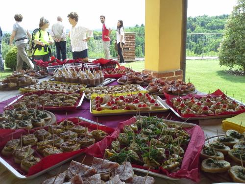 a table filled with many different types of food at B&B Cascina Bellavista in Tigliole