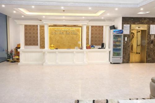 a large room with a counter and a refrigerator at Hotel Ngoc Anh - Van Don in Quang Ninh
