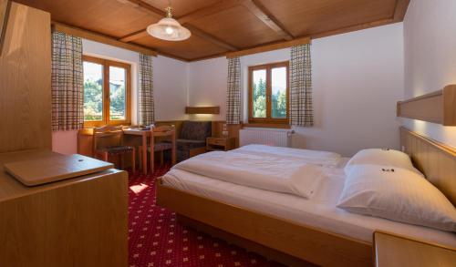 Postel nebo postele na pokoji v ubytování Hotel Bechlwirt