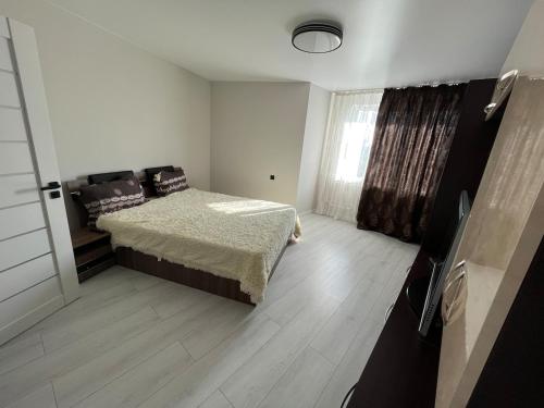 Postel nebo postele na pokoji v ubytování Nice apartment
