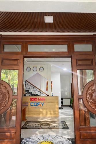 an open door to a office with a desk at Cosy 2 Homestay in Hue