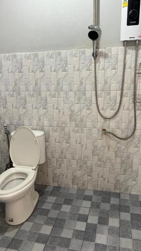 a bathroom with a toilet and a shower at Similan Resort & Water Fall in Ban Lam Ru (1)