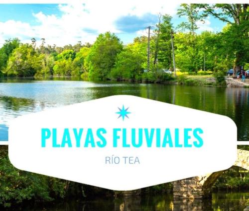 a sign that reads playas fluvias near a river at A Casa do Aloumiño da Auga Mondariz VT-PO-00148 y SPA Prexigueiro Obsequio entrada por persona a circuito termal in San Félix