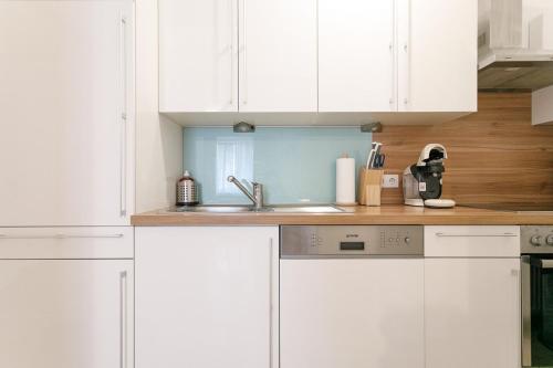 Operasteet Residences - Central Business Apartment