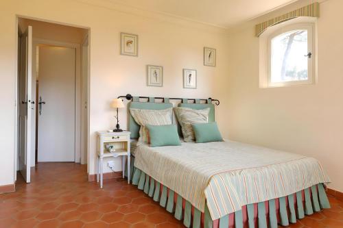 เตียงในห้องที่ Villa Marie