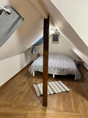 En eller flere senge i et værelse på Maison individuelle 1 chambre
