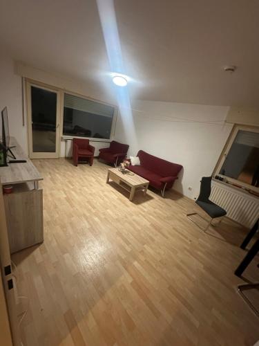 a living room with a couch and a table at Turp Residenz Fewo in Blomberg