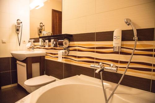 Kúpeľňa v ubytovaní Franko hotel