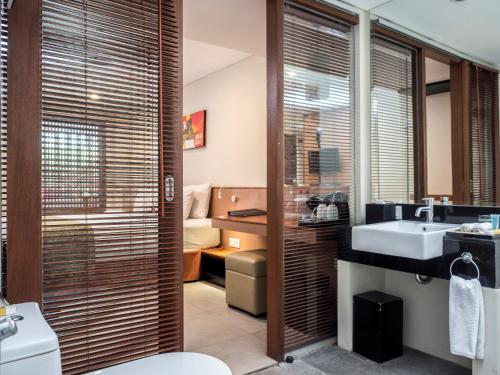 Koupelna v ubytování Savvoya Hotel Seminyak
