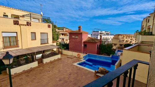 EVH123 Casa adosada con piscina comunitaria