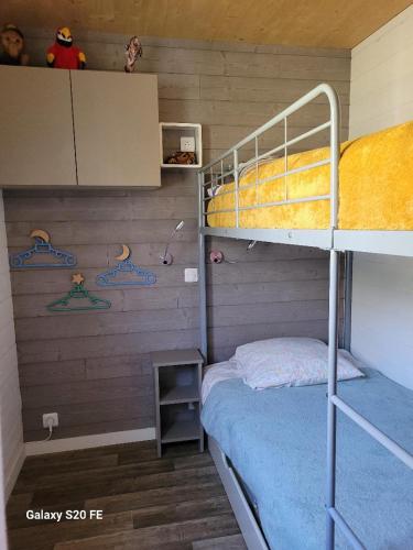 Postel nebo postele na pokoji v ubytování chalet