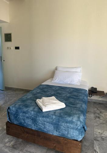 Katil atau katil-katil dalam bilik di Rodon Hotel