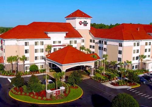 an overhead view of a hotel with red roofs at Best Western Plus Orlando Lake Buena Vista South Inn & Suites in Kissimmee
