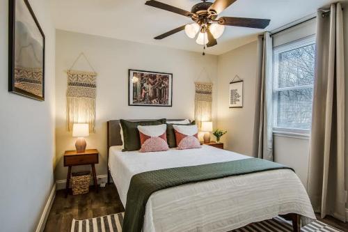 a bedroom with a bed and a ceiling fan at The Southern State of Mind by Stay Local Nashville in Nashville