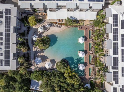 an aerial view of a resort with a pool at Peppers Salt Resort & Spa 2 br luxury spa suite in Kingscliff