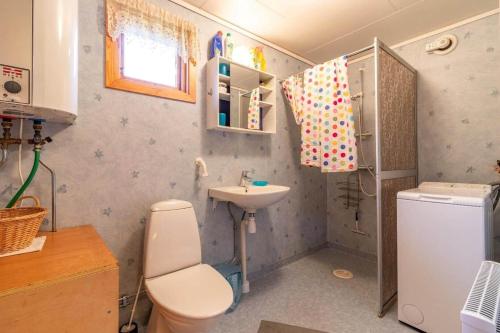 a small bathroom with a toilet and a sink at KRO891-Hallaryd-Kalvshult-8 in Hallaryd