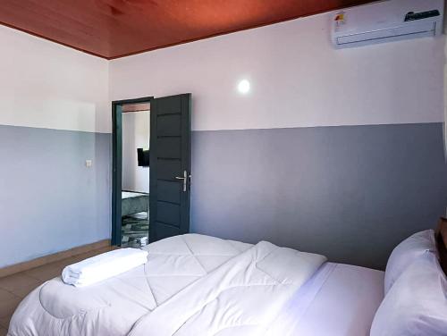 Postel nebo postele na pokoji v ubytování EDEN Lodge ASSINIE