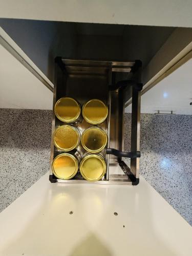 a box of gold detectors sitting on a counter at Lone Star Residence in Jaffna