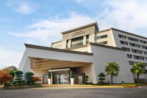 a rendering of the front of a hotel at Hyatt Regency Suites Atlanta Northwest in Atlanta