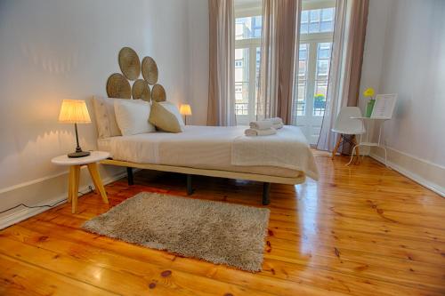 Ένα ή περισσότερα κρεβάτια σε δωμάτιο στο Chalet D´Ávila Guest House