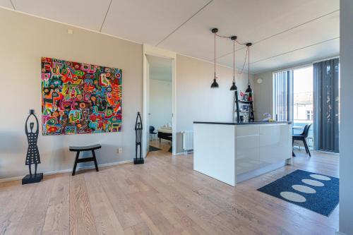 Foto Modern Apartment with Balcony near Tivoli & Metro 4