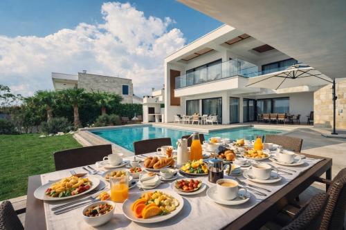 Beachfront Villa with Heated Infinity Pool and Direct Sea Access Kastela near Split
