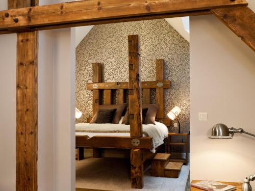 Postel nebo postele na pokoji v ubytování Aspria Royal La Rasante Hotel & Spa