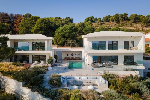 an aerial view of a house with a swimming pool at Luxury Villas Skiathos in Skiathos