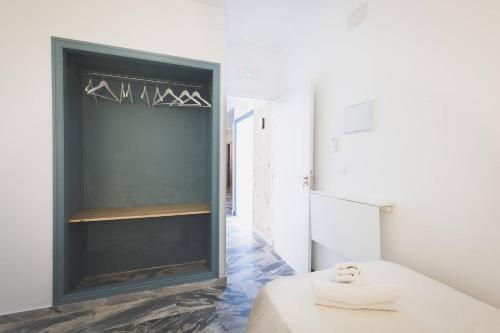 a room with a bed and a fireplace at Hotel Rural Macondo in Trujillanos