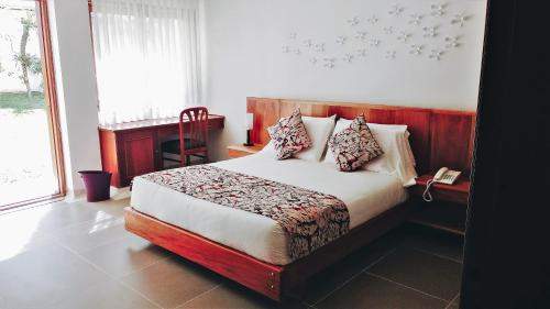 Cama o camas de una habitación en Hotel Belén Boutique