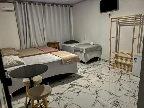 เตียงในห้องที่ Hotel WM