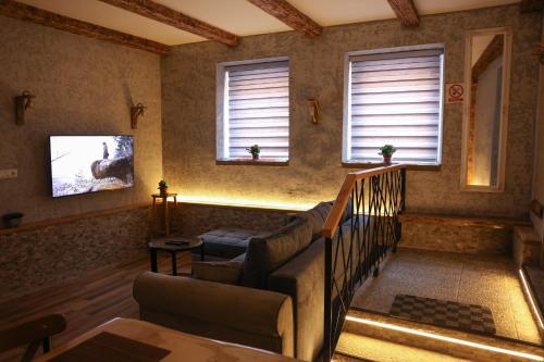 Et opholdsområde på Apartman Simple