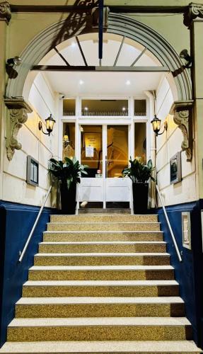 a set of stairs leading up to a building at Great Malvern Hotel in Great Malvern