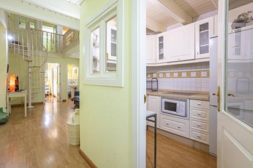 Duplex en antigua casa Palacio - Calle San Isidoro