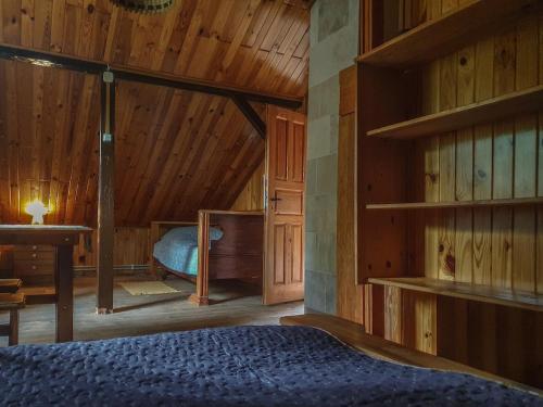 Llit o llits en una habitació de Kałamunka