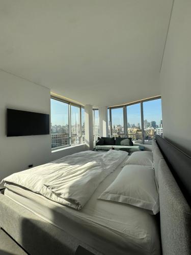 Llit o llits en una habitació de SAIFI Apartments